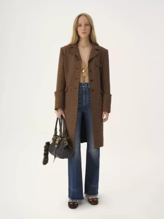 Riding coat in houndstooth wool Riding coat in houndstooth wool