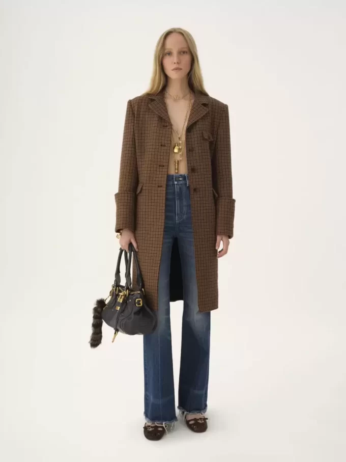 Riding coat in houndstooth wool Riding coat in houndstooth wool