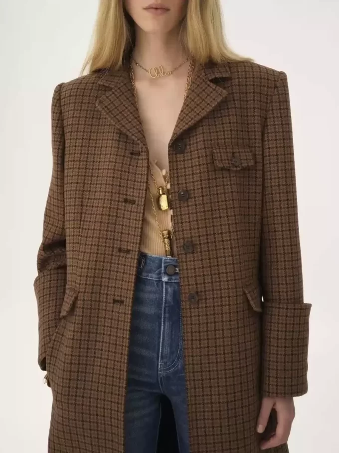 Riding coat in houndstooth wool Riding coat in houndstooth wool