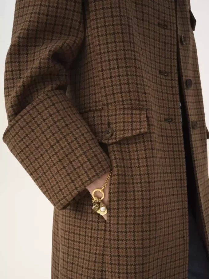 Riding coat in houndstooth wool Riding coat in houndstooth wool