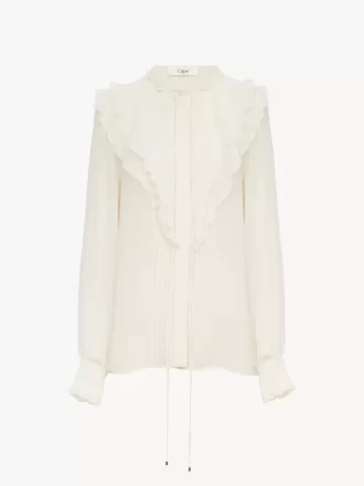 Ruffled blouse in silk georgette