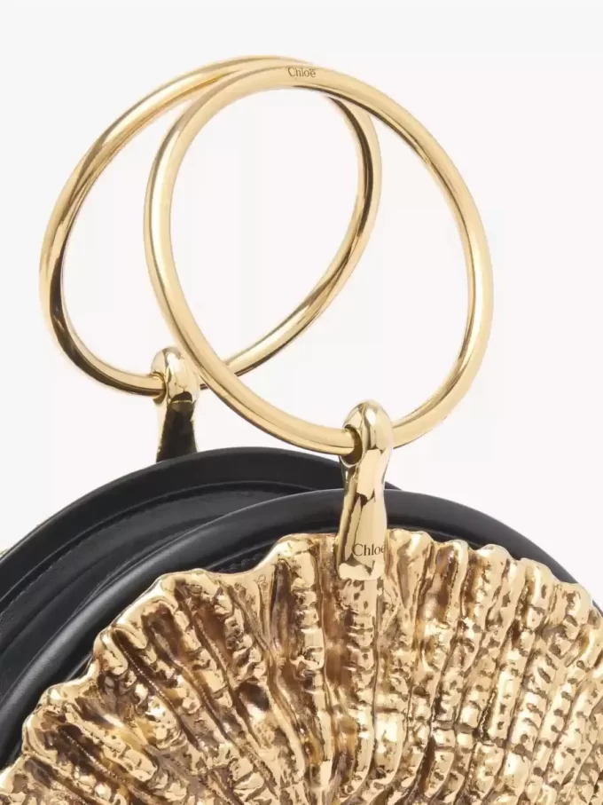 Sea Treasures Shell zipped clutch in soft leather & metal Sea Treasures Shell zipped clutch in soft leather & metal