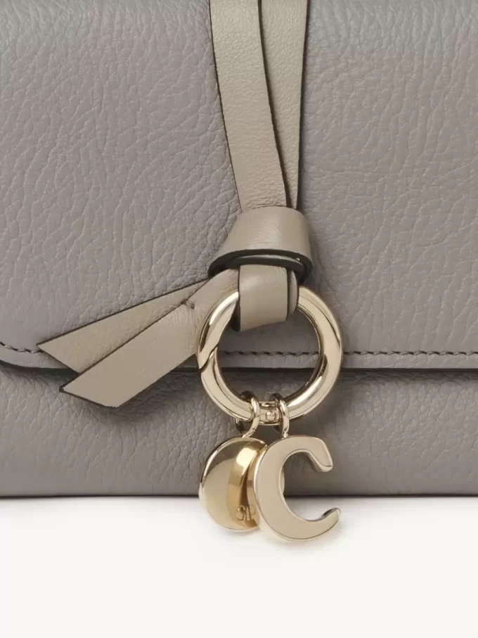 Small Alphabet tri-fold in grained leather Small Alphabet tri-fold in grained leather