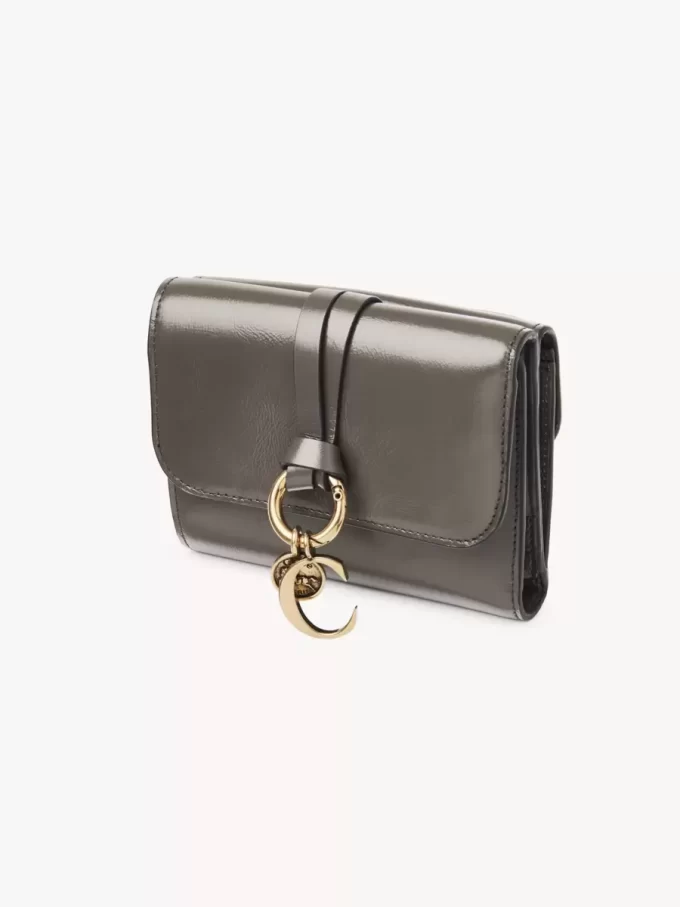 Small Alphabet tri-fold in shiny leather Small Alphabet tri-fold in shiny leather