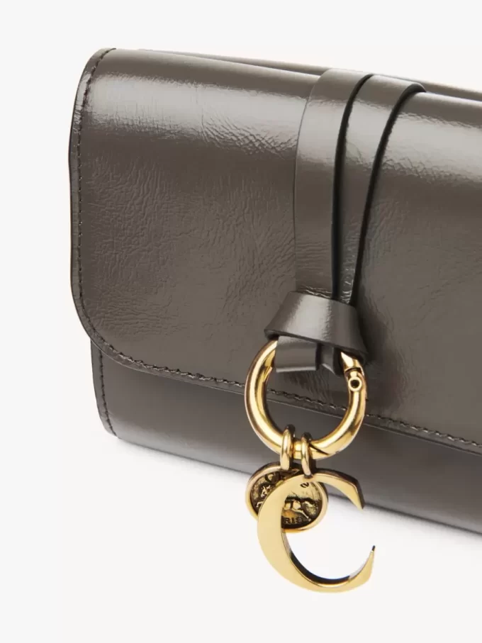 Small Alphabet tri-fold in shiny leather Small Alphabet tri-fold in shiny leather