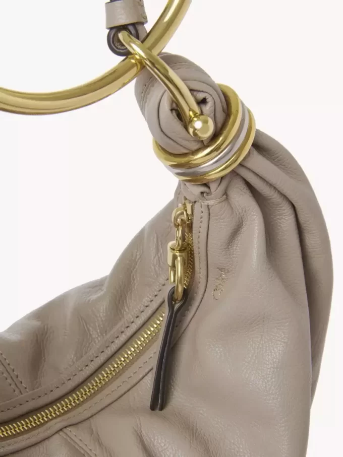 Small Bracelet hobo bag in grained leather Small Bracelet hobo bag in grained leather