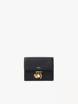 Small Chloé Charms tri-fold wallet in grained leather Small Chloé Charms tri-fold wallet in grained leather