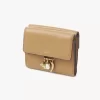 Small Chloé Charms tri-fold wallet in grained leather Small Chloé Charms tri-fold wallet in grained leather