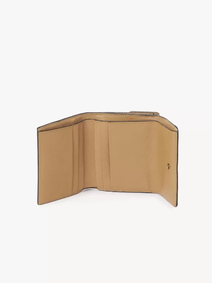 Small Chloé Charms tri-fold wallet in grained leather Small Chloé Charms tri-fold wallet in grained leather