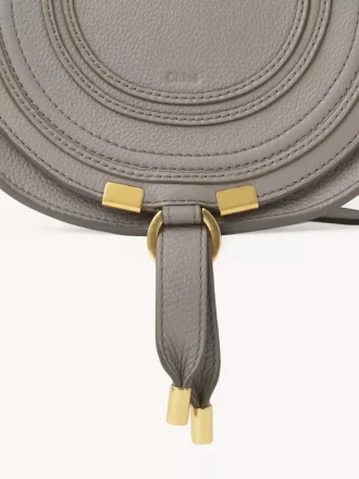 Small Marcie saddle bag in grained leather