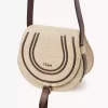 Small Marcie saddle bag in raffia-effect fibers Small Marcie saddle bag in raffia-effect fibers