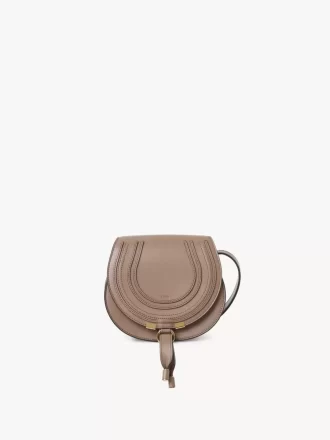 Small Marcie saddle bag in shiny leather
