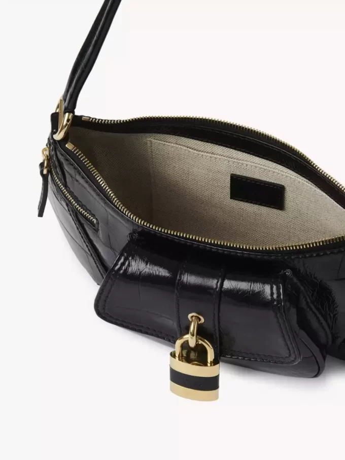 The 99 shoulder bag in croco-effect leather The 99 shoulder bag in croco-effect leather