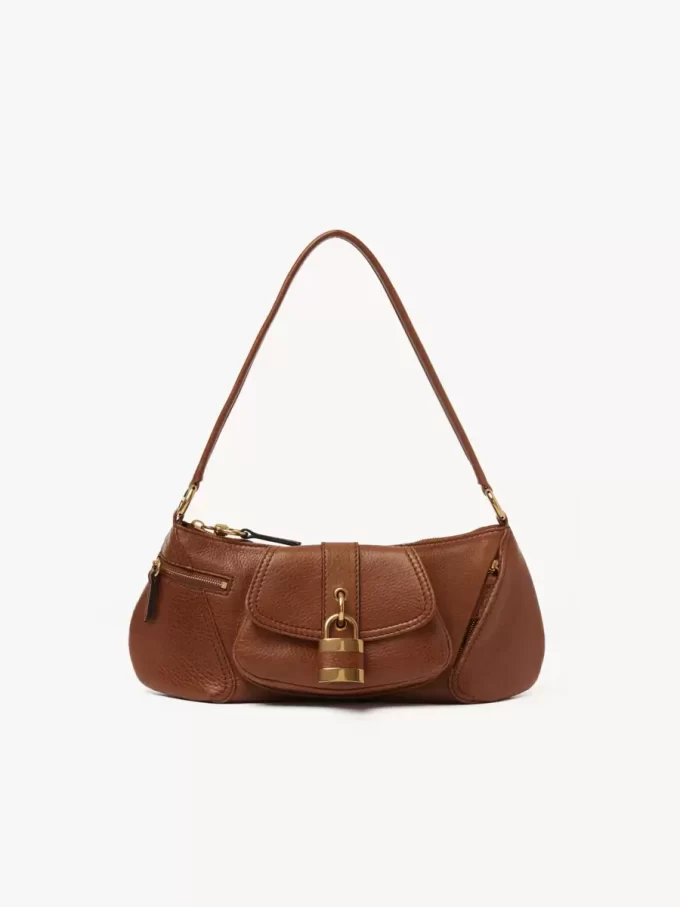 The 99 shoulder bag in grained leather The 99 shoulder bag in grained leather