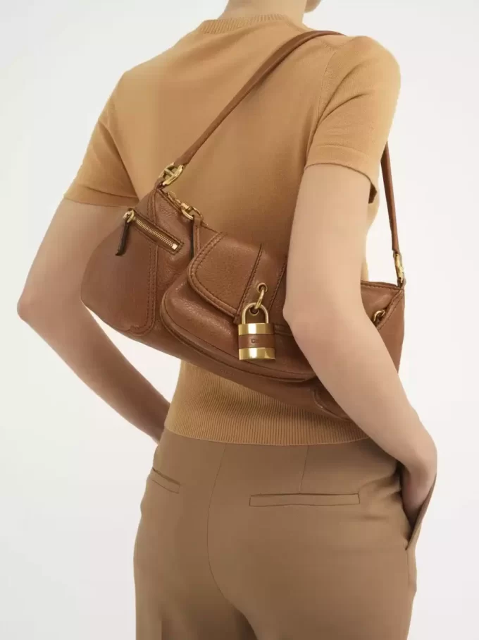 The 99 shoulder bag in grained leather The 99 shoulder bag in grained leather