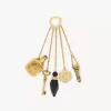 The Château Treasures charm in brass & resin The Château Treasures charm in brass & resin