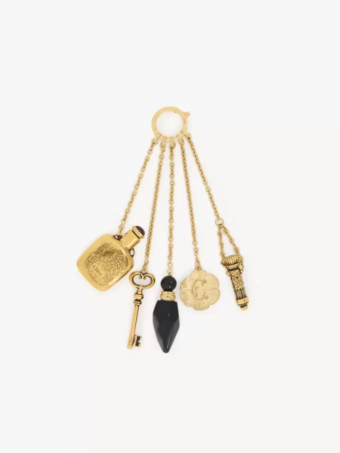 The Château Treasures charm in brass & resin The Château Treasures charm in brass & resin