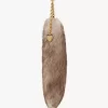 The Treasure Tails charm in shearling The Treasure Tails charm in shearling