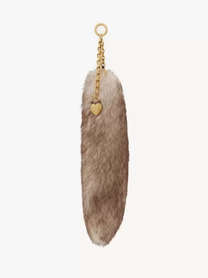 The Treasure Tails charm in shearling The Treasure Tails charm in shearling