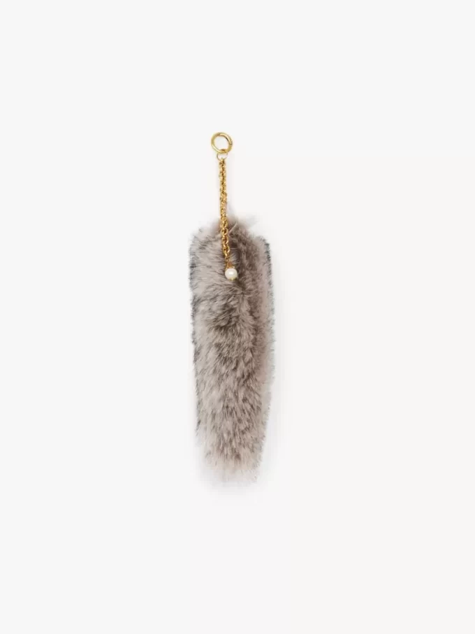 The Treasure Tails charm in shearling The Treasure Tails charm in shearling