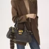 The Treasure Tails charm in shearling The Treasure Tails charm in shearling