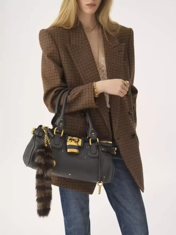 The Treasure Tails charm in shearling The Treasure Tails charm in shearling