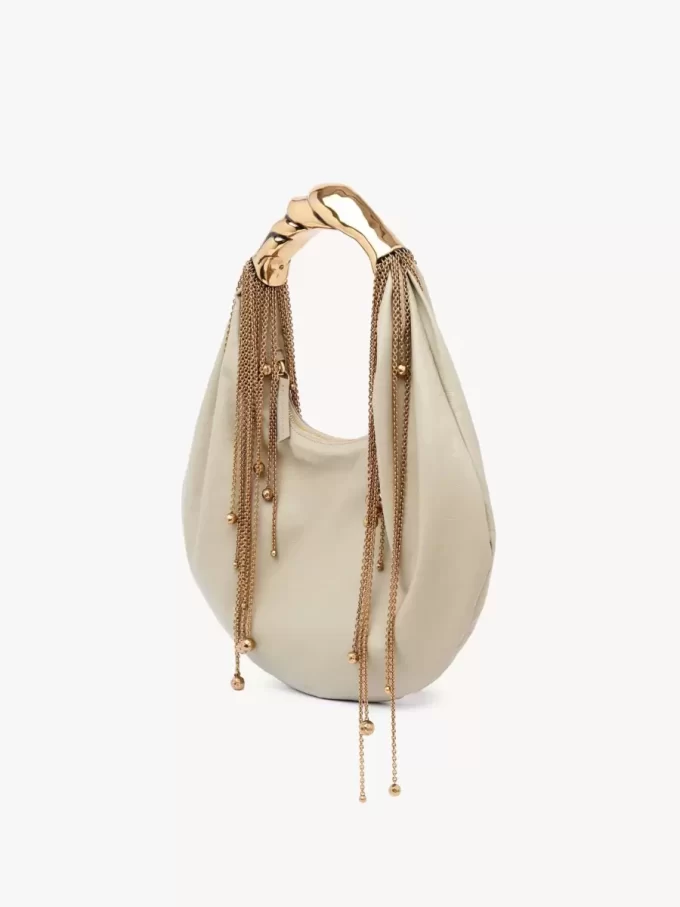 Twisted Shell hobo bag in shiny leather Twisted Shell hobo bag in shiny leather
