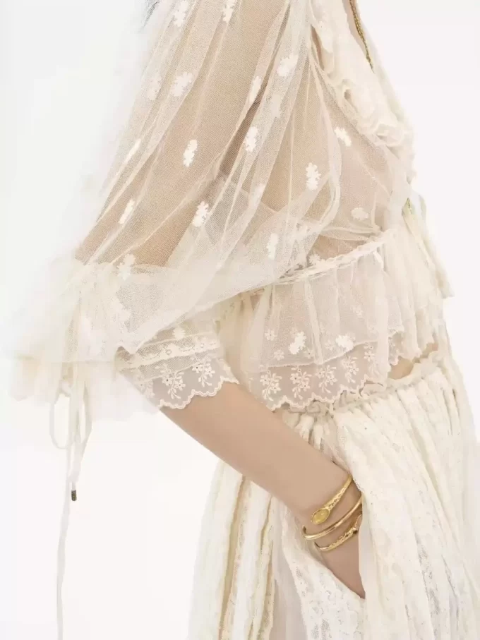 V-neck ruffle top in embroidered lace V-neck ruffle top in embroidered lace